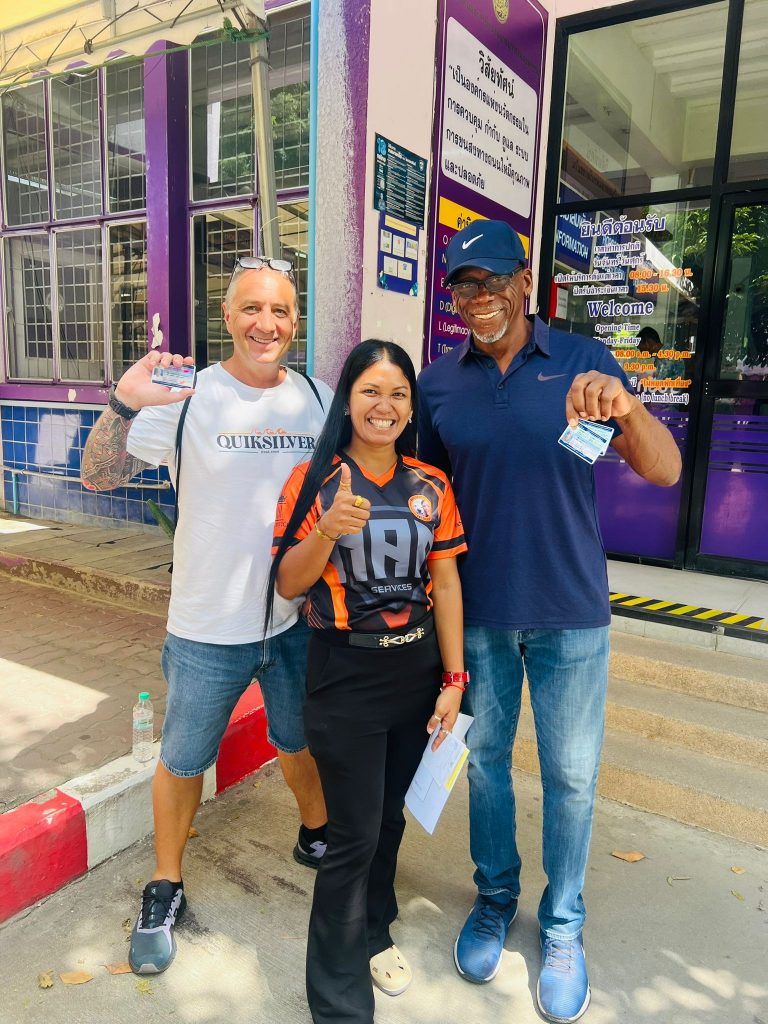 Smiling clients of Jomtien visa agency with there new thai driving licenses