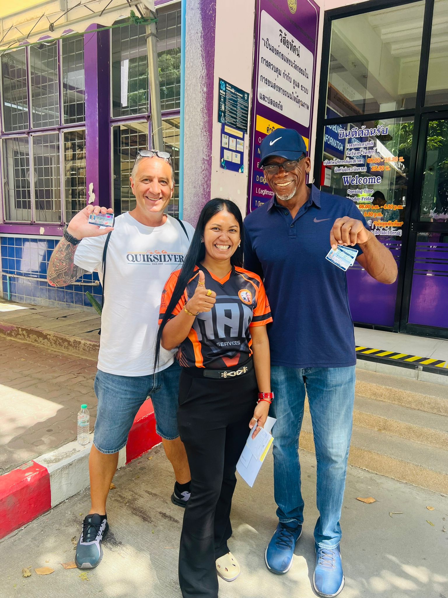 Smiling clients of Jomtien visa agency with there new thai driving licenses